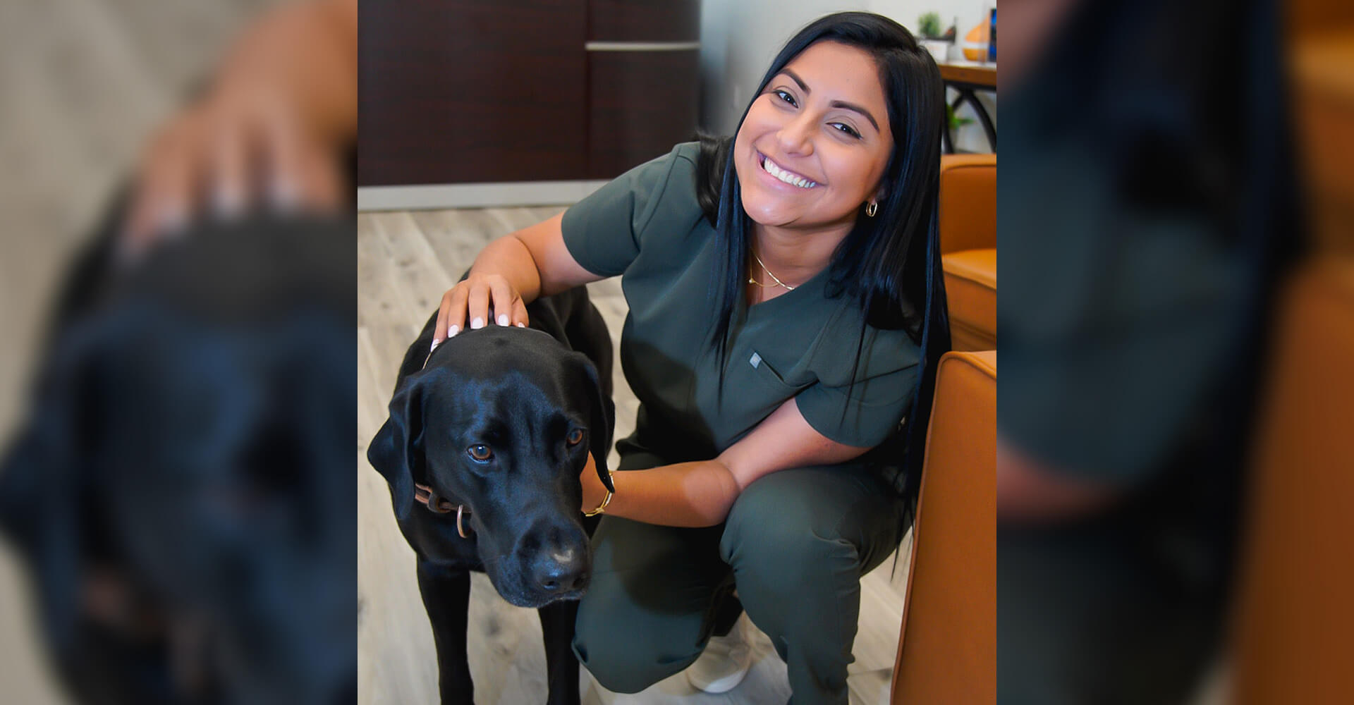 Team member with a dog at Karande Biological Dentistry